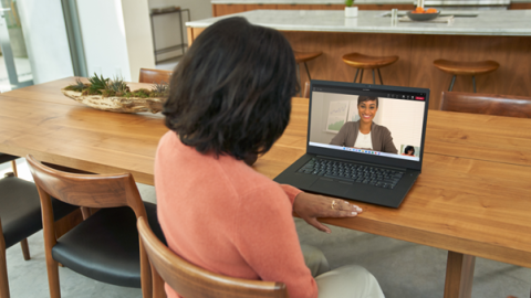 A woman on a Microsoft Teams telehealth call with their doctor.