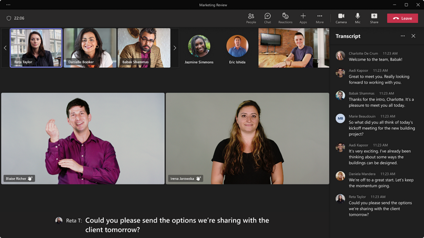 Teams meeting window showing two sign language interpreters prioritized on center stage.