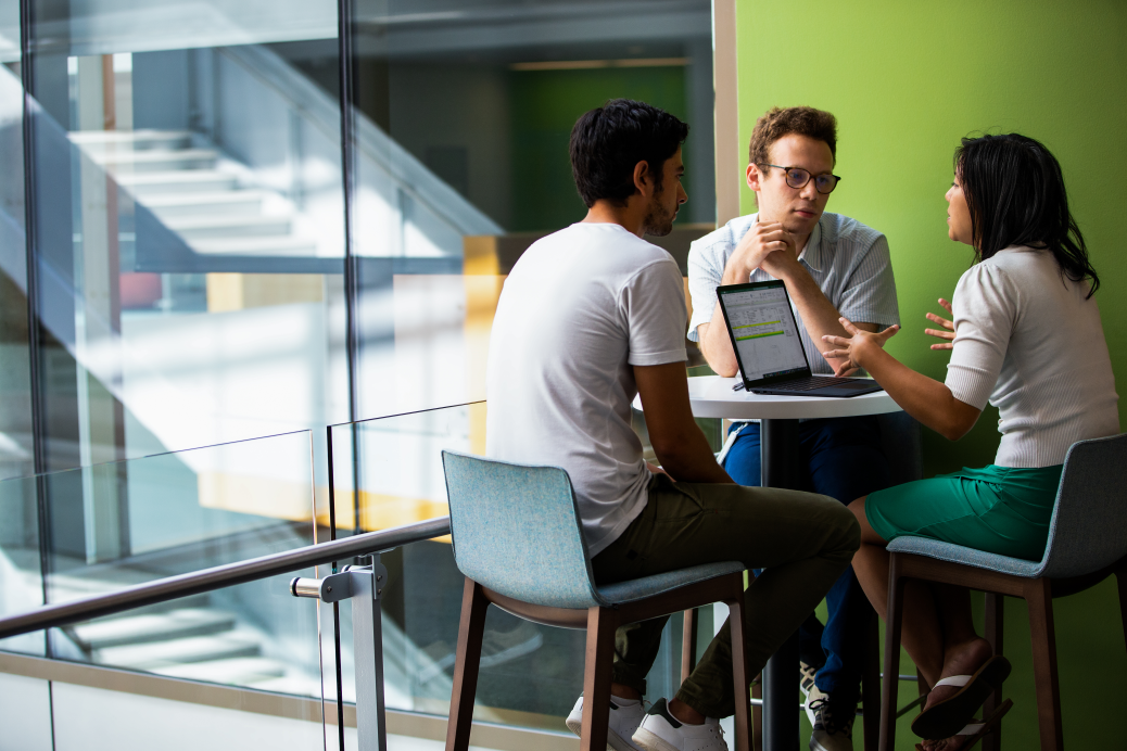 People sitting on desk at office