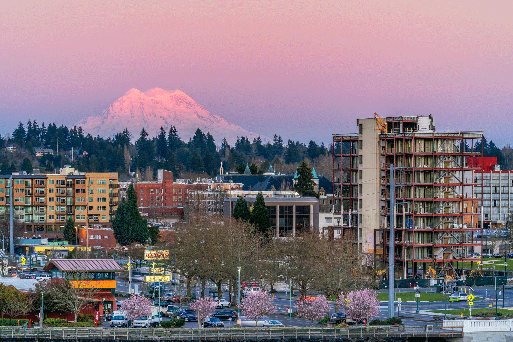 A group of apartments with Mount Rainier in the background